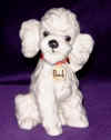 Pooch_._sitting_with_red_collar00.jpg (6520 bytes)